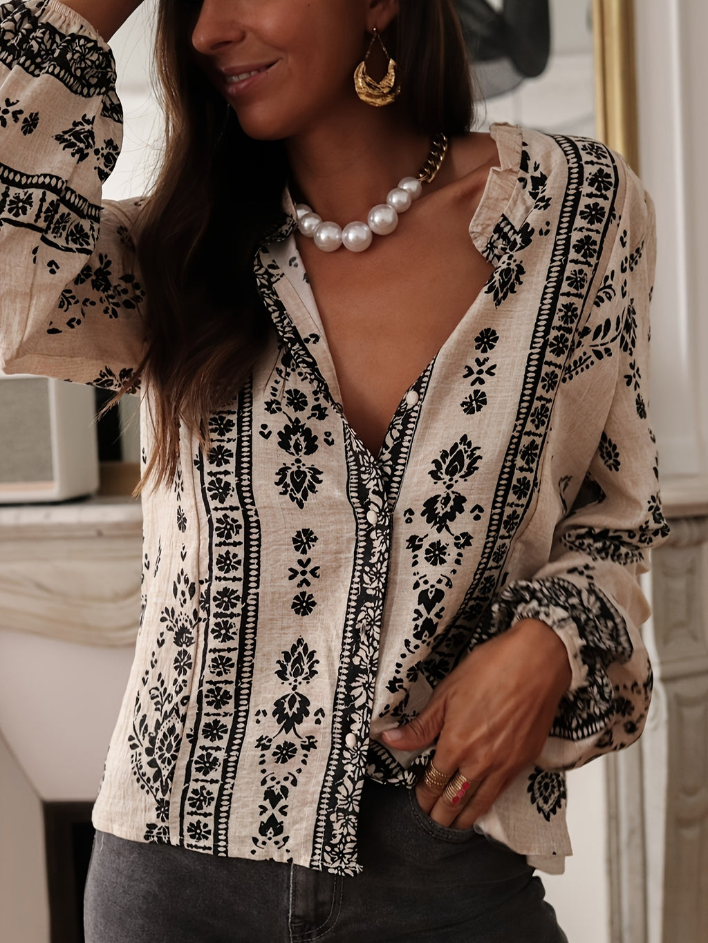 Halcyon | Locker geschnittene Bluse mit geometrischem Print und Laternenärmeln