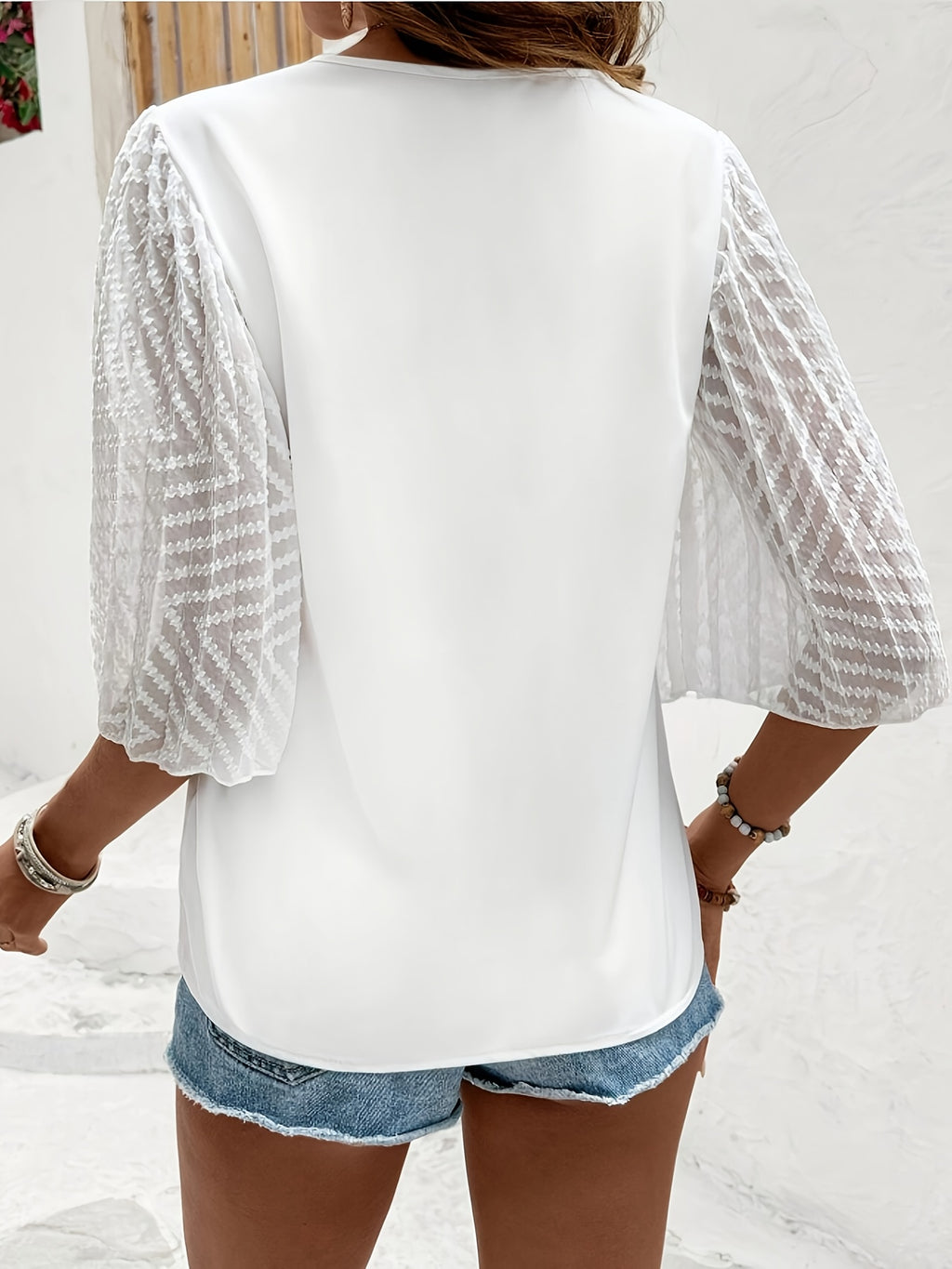 Wyra | Damesblouse met losse pasvorm, V-hals en lange mouwen