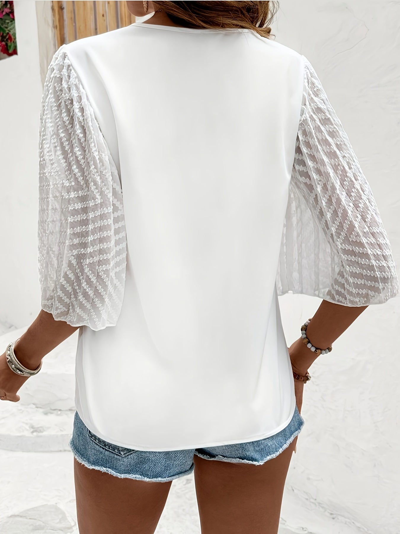 Wyra | Damesblouse met losse pasvorm, V-hals en lange mouwen