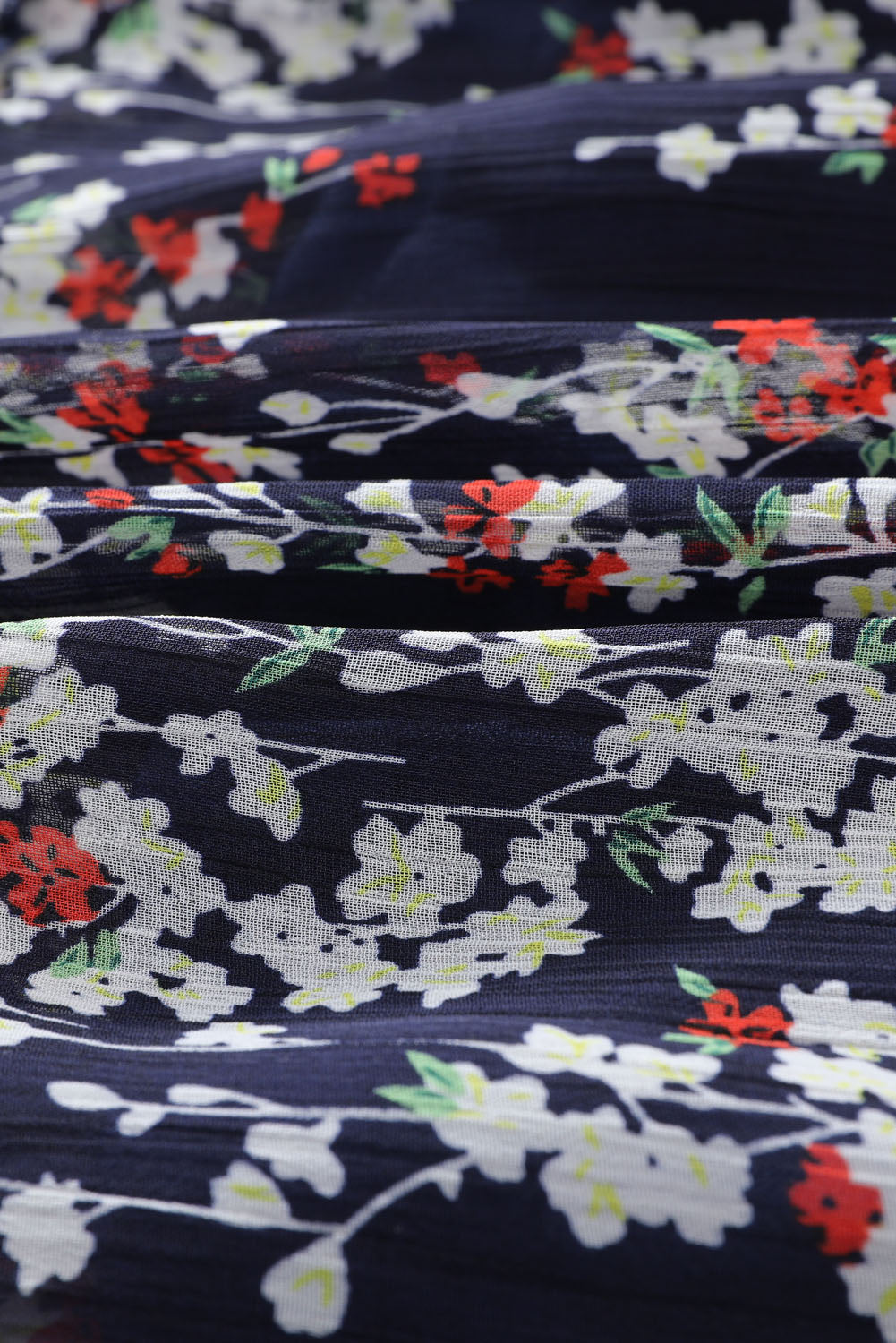 Nevara | Blauwe bloemenjurk voor dames met ruches, open rug, zomerse feest- en casual outfit