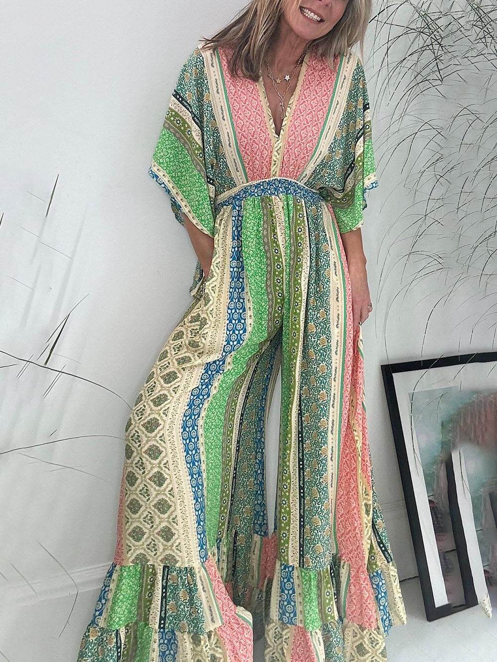 Livia | Retro-Jumpsuit mit weiten Beinen und ausgestellten Ärmeln 