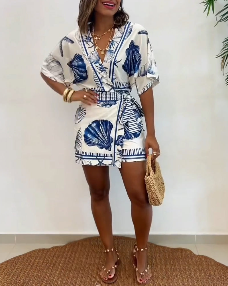 Lyrithia | Jumpsuit met V-hals en strandprint voor dames – Korte zomerjumpsuit