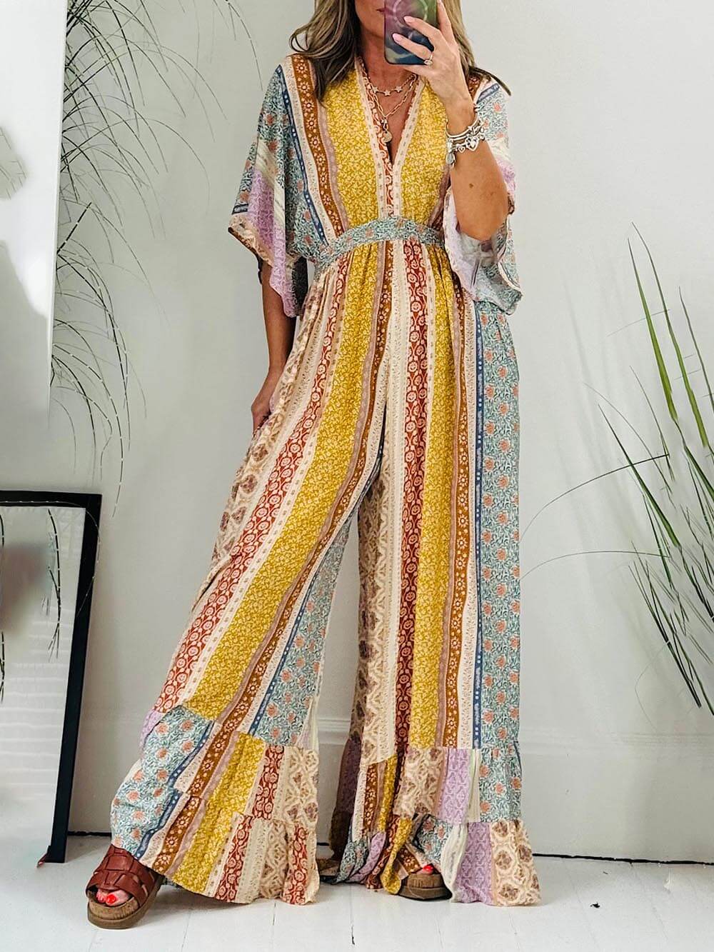 Livia | Retro-Jumpsuit mit weiten Beinen und ausgestellten Ärmeln 