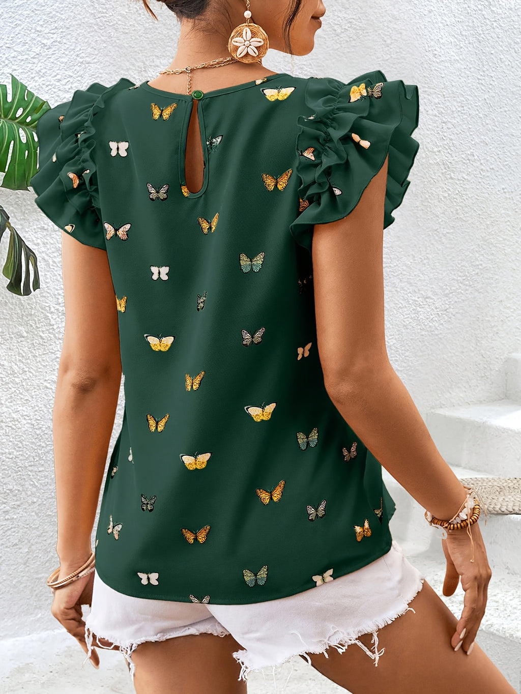 Islyn | Vakantietop voor dames – Elegante blouse met vlinderprint en ruches aan de mouwen