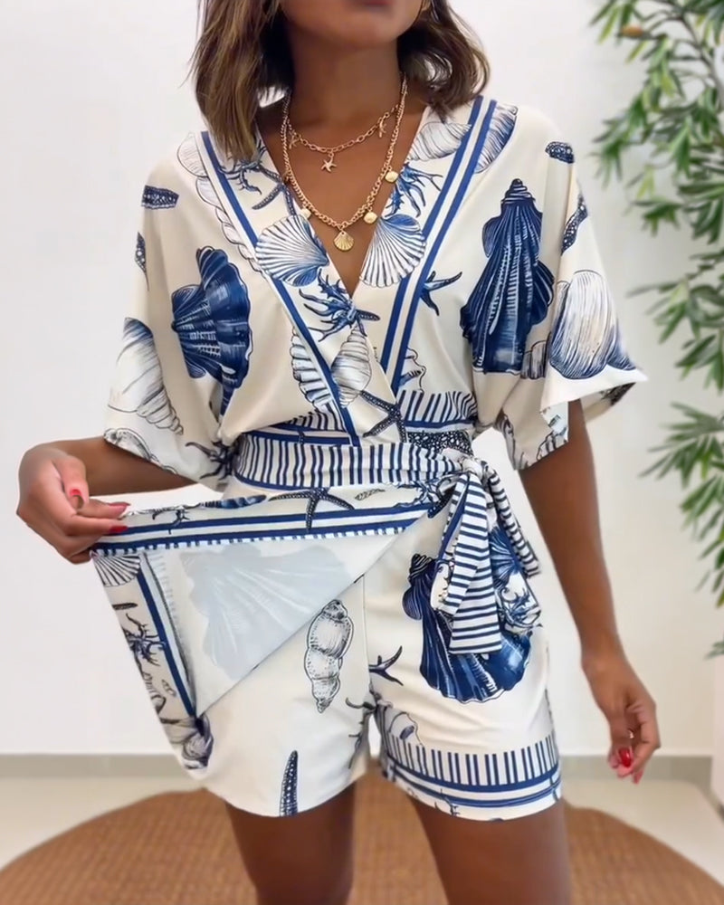 Lyrithia | Jumpsuit met V-hals en strandprint voor dames – Korte zomerjumpsuit