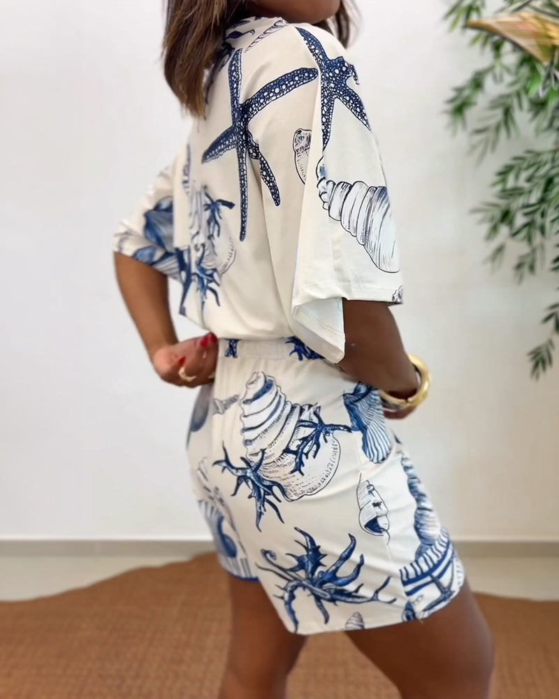 Lyrithia | Jumpsuit met V-hals en strandprint voor dames – Korte zomerjumpsuit