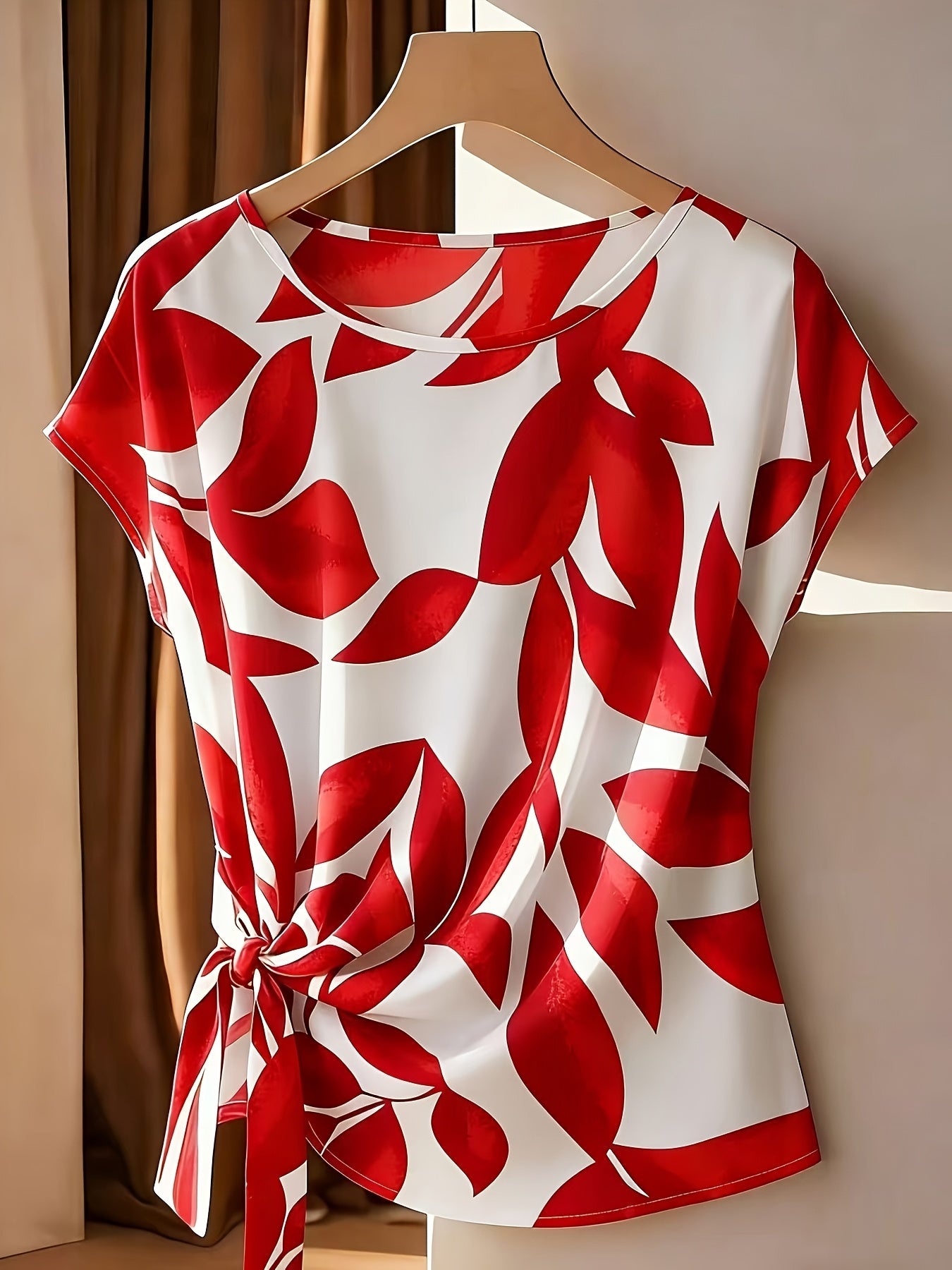 Belyn | Damesmode - Casual blouse met print, strik in de hals en geplooide manchetten