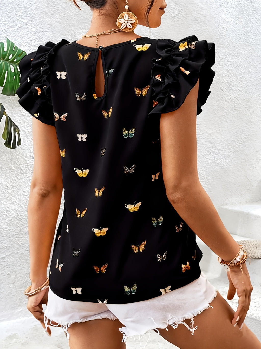Islyn | Vakantietop voor dames – Elegante blouse met vlinderprint en ruches aan de mouwen