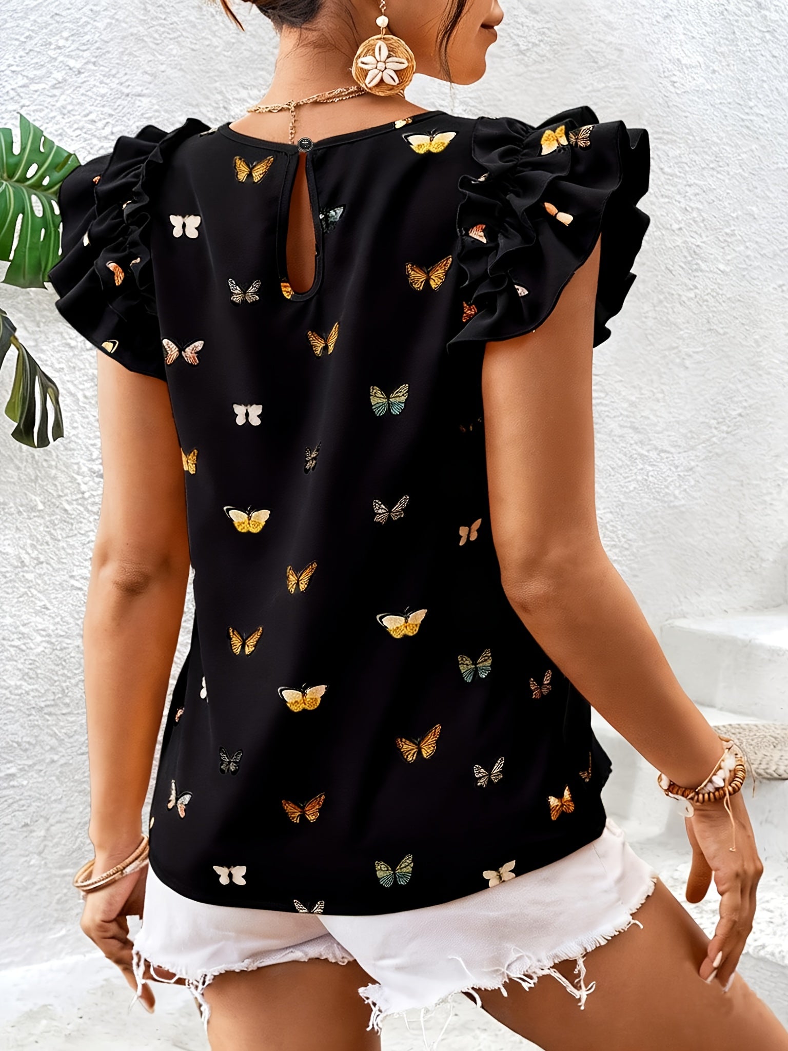 Islyn | Vakantietop voor dames – Elegante blouse met vlinderprint en ruches aan de mouwen