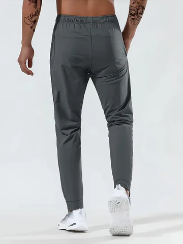 Kaevor | Stretch joggingbroek voor heren met slanke pasvorm en zakken met rits