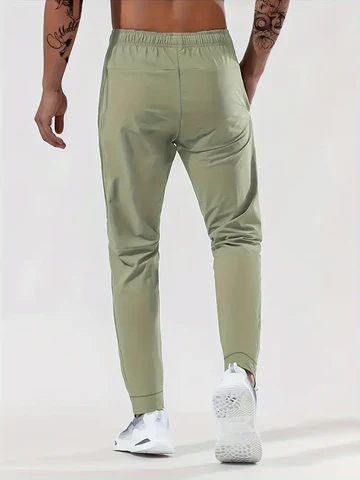 Kaevor | Stretch joggingbroek voor heren met slanke pasvorm en zakken met rits