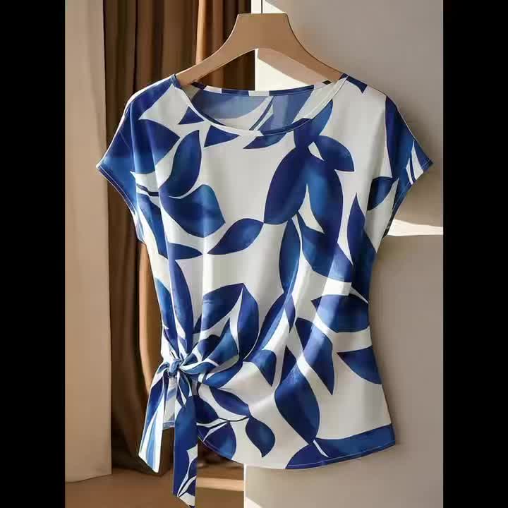 Belyn | Damesmode - Casual blouse met print, strik in de hals en geplooide manchetten