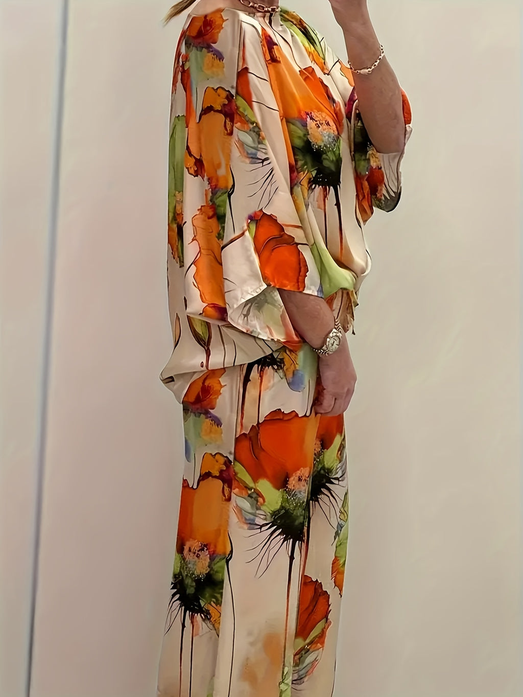 Evora | Vrouwenset met bloemenprint - Vloeiende blouse en broek met wijde pijpen