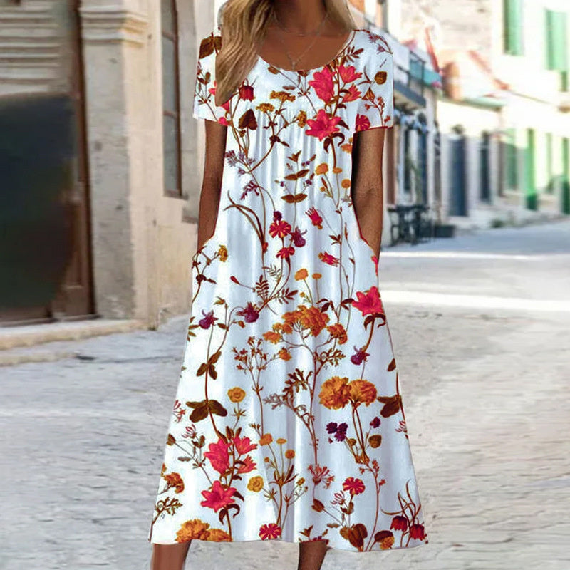 Pomi | Zomerjurk met bloemenprint voor dames – Midi-jurk met losse pasvorm die de buik bedekt