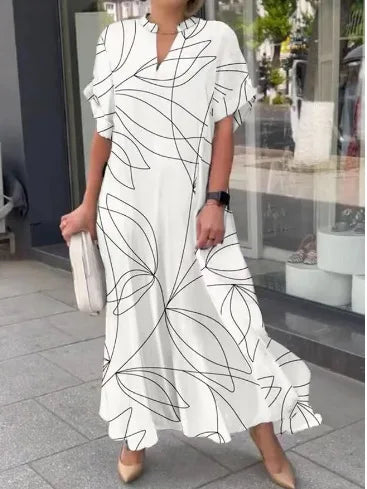 Naela | Gestreepte lange zomerjurk – Lichte maxi-strandoutfit voor dames