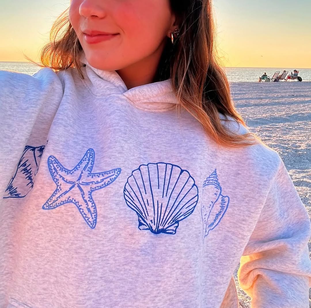 Coasta | Unisex-Sweatshirt mit minimalistischen Muschelstickereien – Lässiger Pullover aus weicher Baumwolle