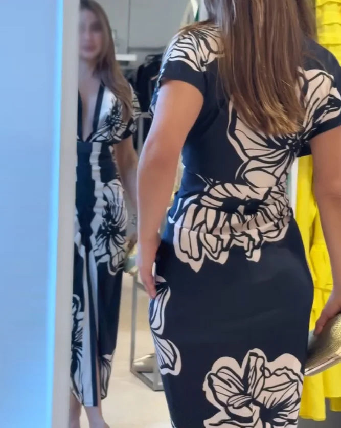 Airi | Zomerse midi-jurk met bloemenprint – Lichte, casual en elegante damesjurk met print