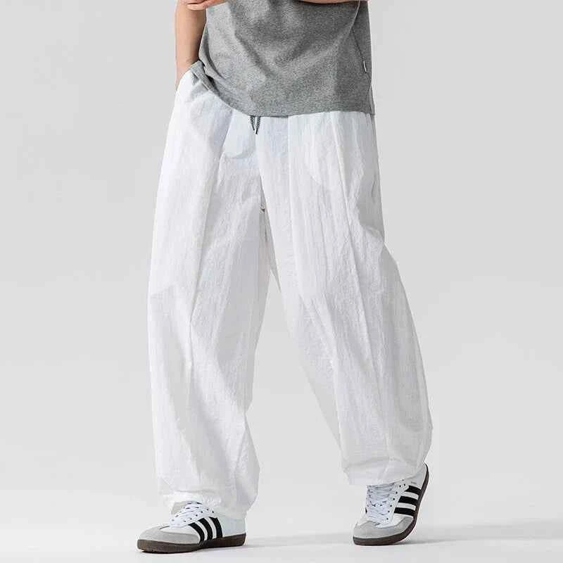 Olya | Nimbus-parachutebroek voor heren – Y2K-joggingbroek met baggy pasvorm en cargo-zakken