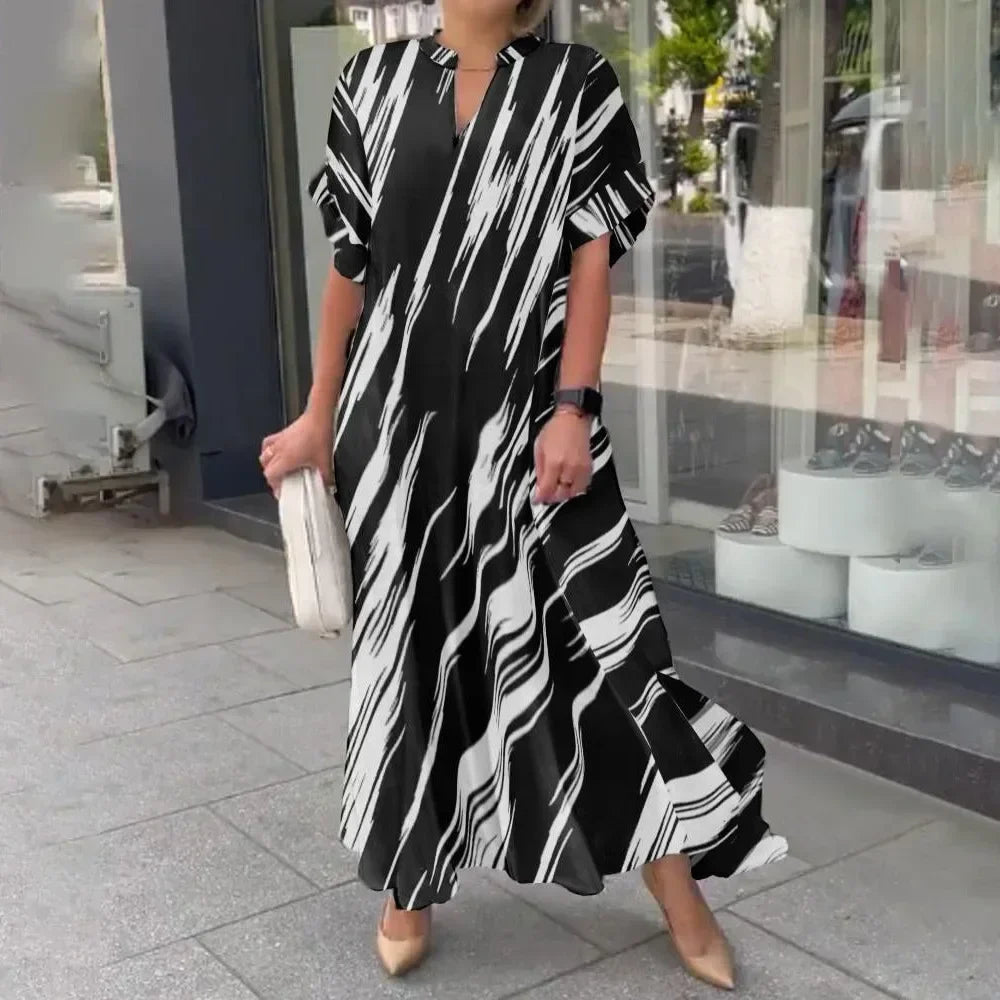 Naela | Gestreepte lange zomerjurk – Lichte maxi-strandoutfit voor dames