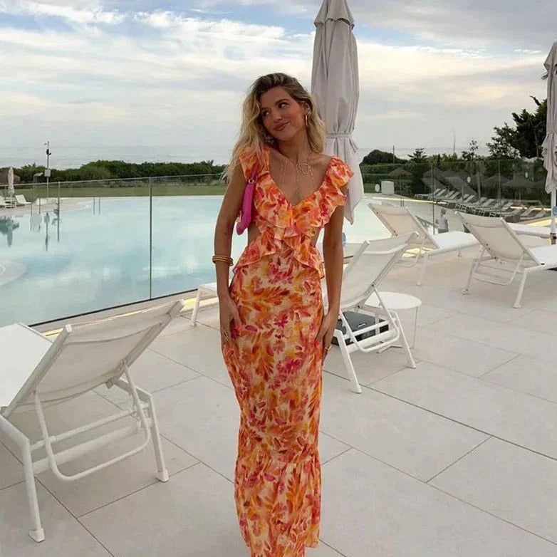 Xandra | Dames oranje zomerjurk – midi zonnejurk met ruches