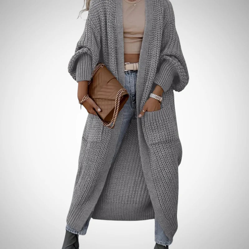 Delvessa | Lange, grof gebreide damesvest met zakken, comfortabele herfst-wintertrui, casual jas