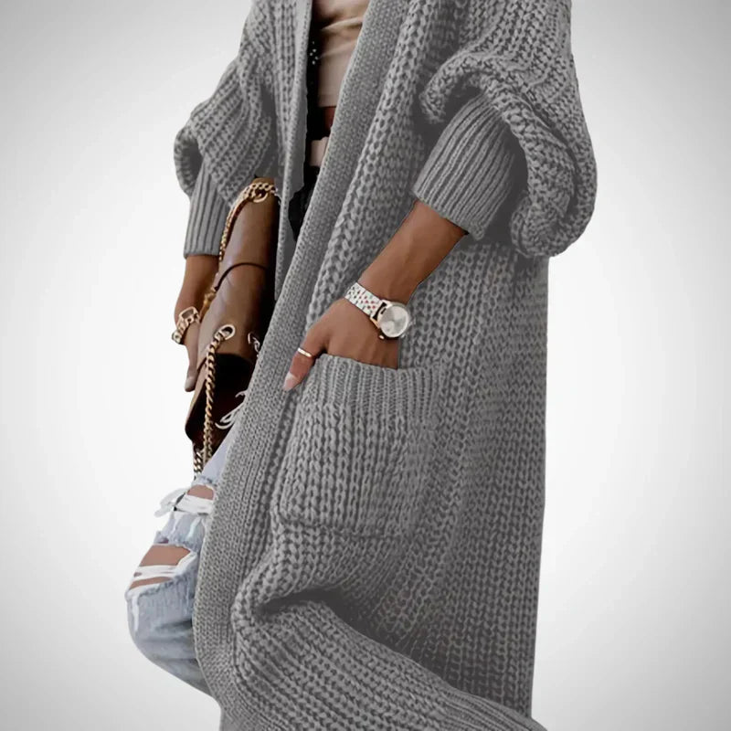 Delvessa | Lange, grof gebreide damesvest met zakken, comfortabele herfst-wintertrui, casual jas