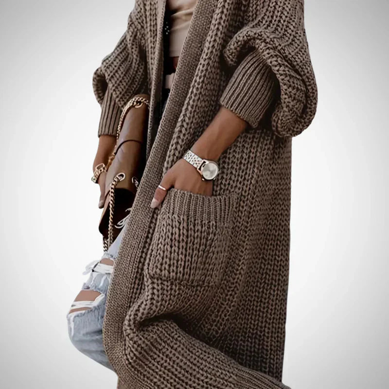 Delvessa | Lange, grof gebreide damesvest met zakken, comfortabele herfst-wintertrui, casual jas