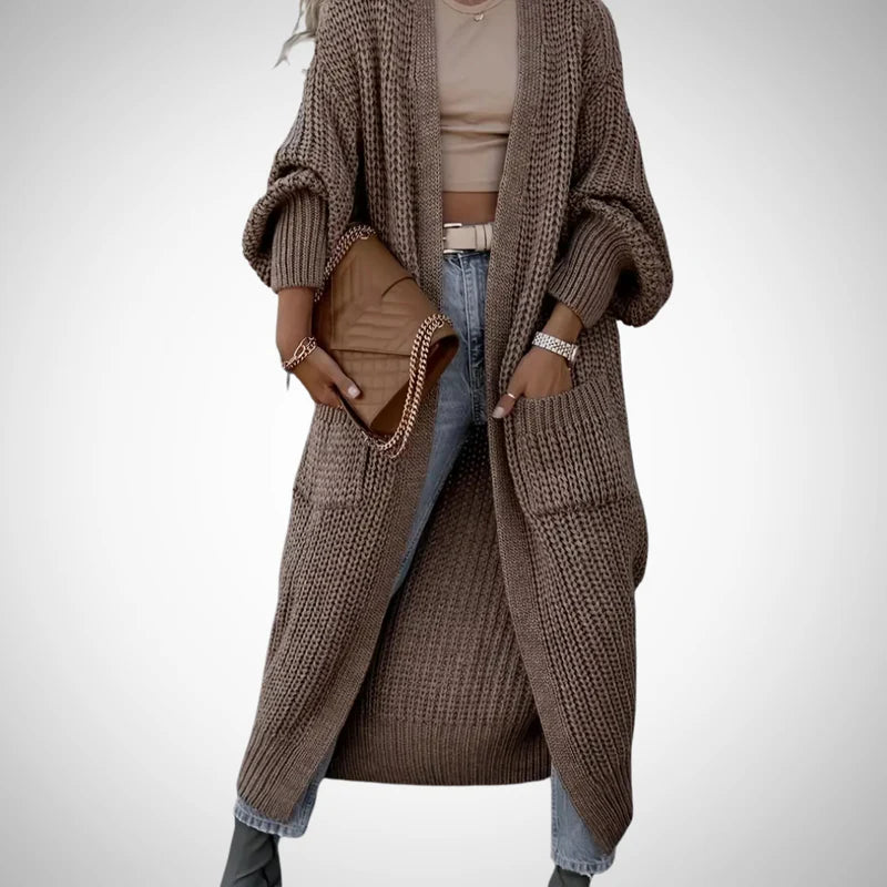 Delvessa | Lange, grof gebreide damesvest met zakken, comfortabele herfst-wintertrui, casual jas