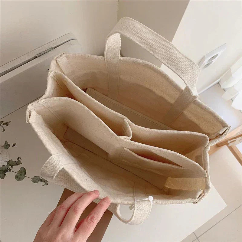 Lura | Canvas draagtas voor dames – schoudertas met meerdere vakken