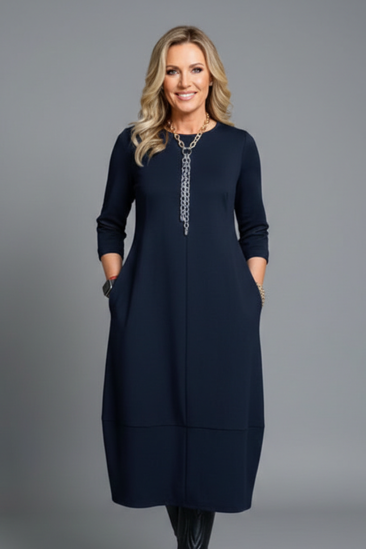 Dira | Midi-jurk voor dames – Casual jurk met ronde hals en losse pasvorm, voorzien van zakken