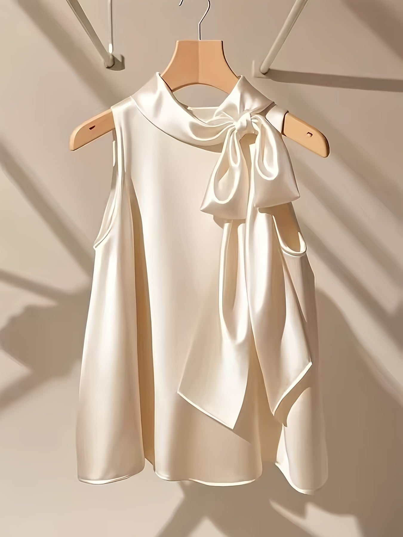 Azae | Mouwloze damesblouse met strik, elegant, effen, ronde hals