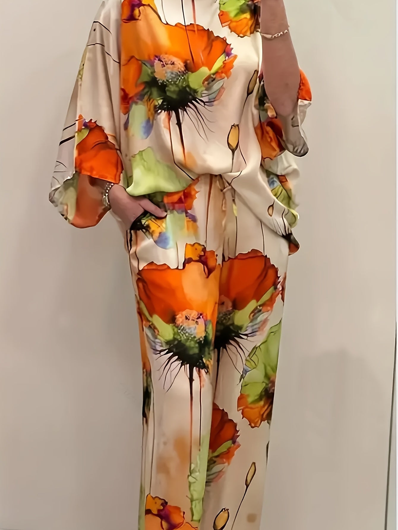 Evora | Vrouwenset met bloemenprint - Vloeiende blouse en broek met wijde pijpen