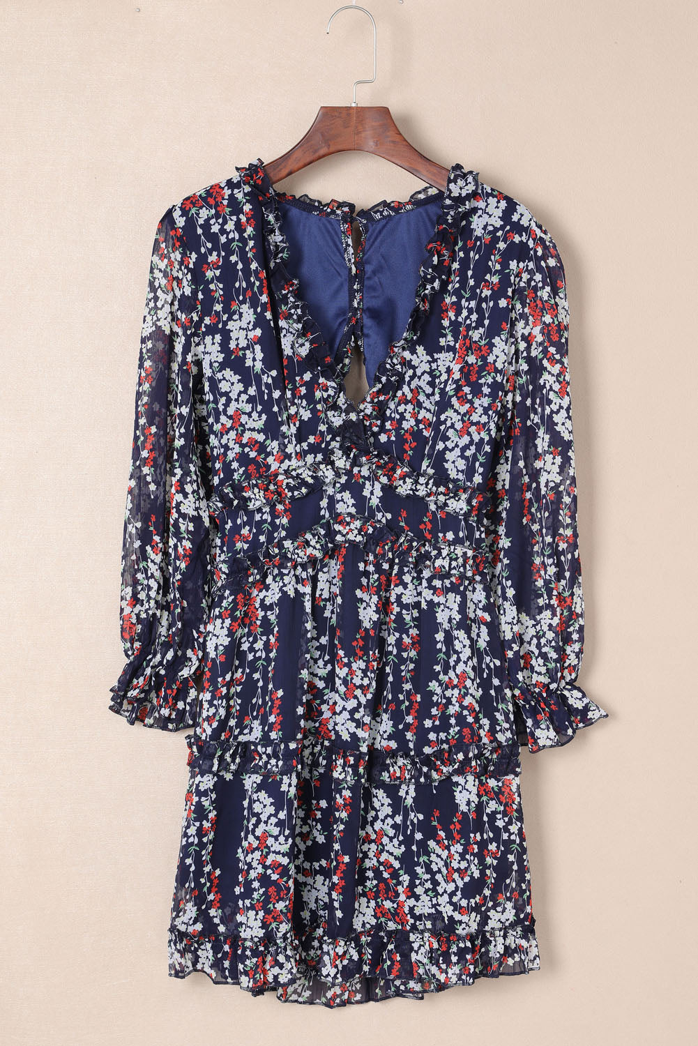 Nevara | Blauwe bloemenjurk voor dames met ruches, open rug, zomerse feest- en casual outfit