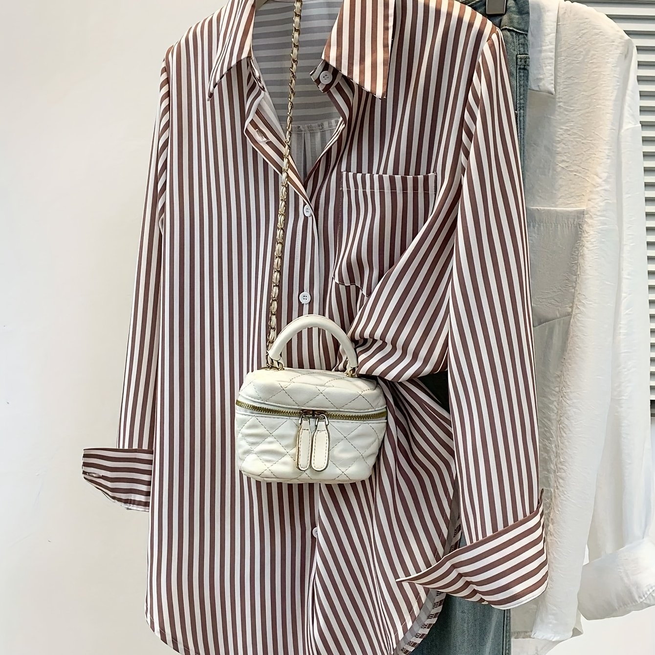 Mirelynn | Gestreepte damesblouse met knopen en lange mouwen