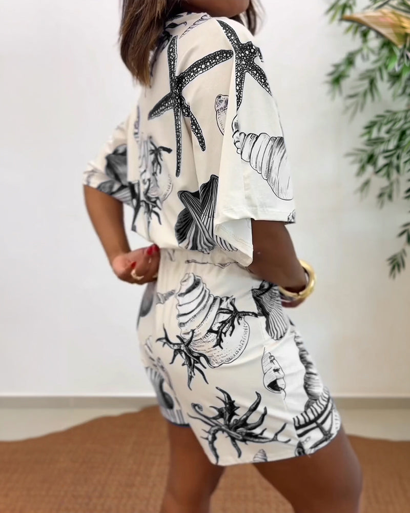 Lyrithia | Jumpsuit met V-hals en strandprint voor dames – Korte zomerjumpsuit