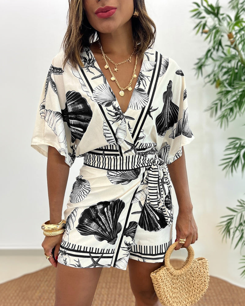 Lyrithia | Jumpsuit met V-hals en strandprint voor dames – Korte zomerjumpsuit