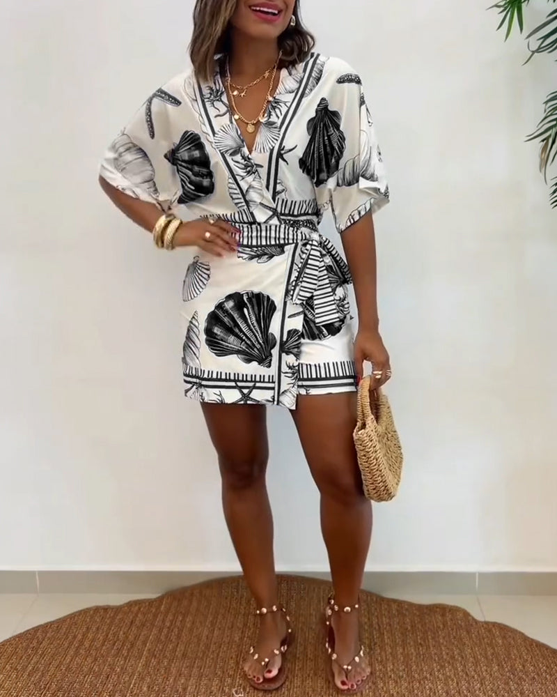 Lyrithia | Jumpsuit met V-hals en strandprint voor dames – Korte zomerjumpsuit