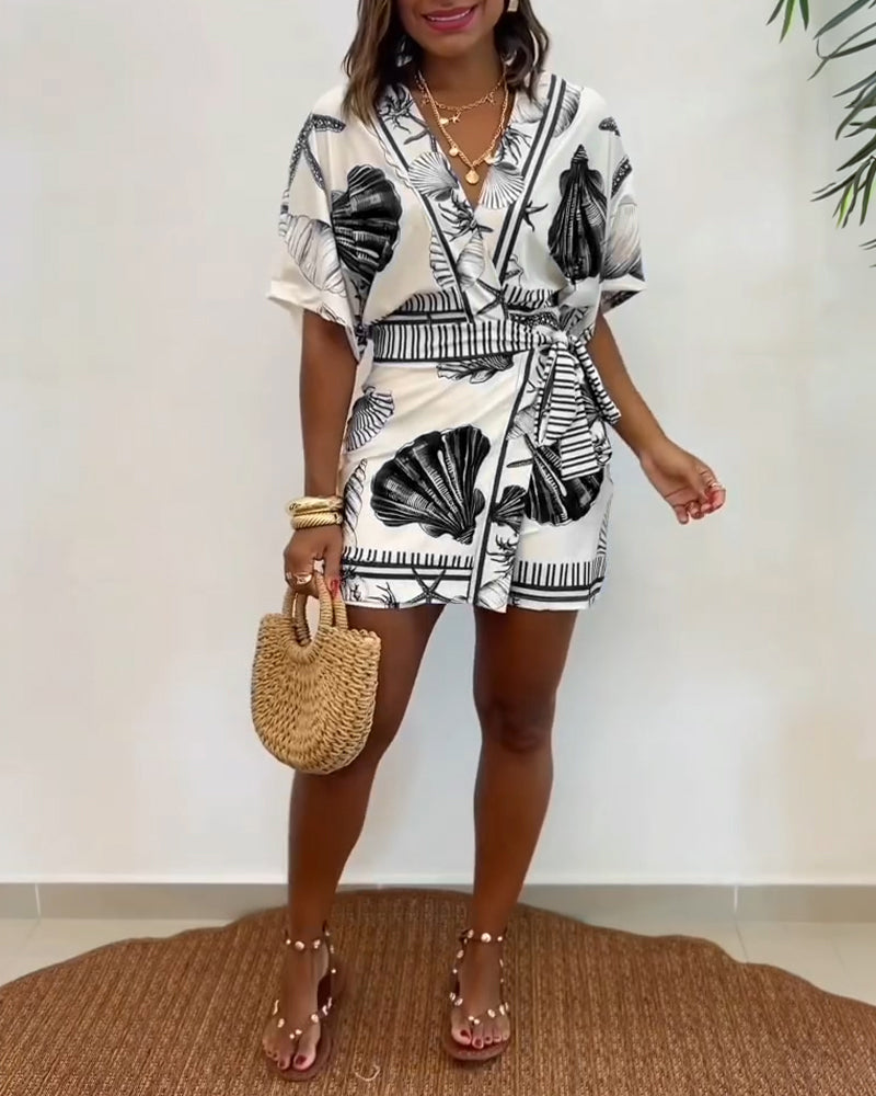Lyrithia | Jumpsuit met V-hals en strandprint voor dames – Korte zomerjumpsuit