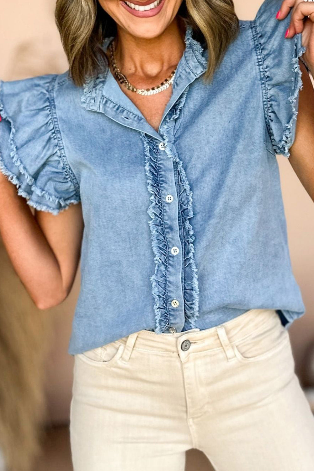 Lysara | Denim blouse met knoopsluiting en fladdermouwen