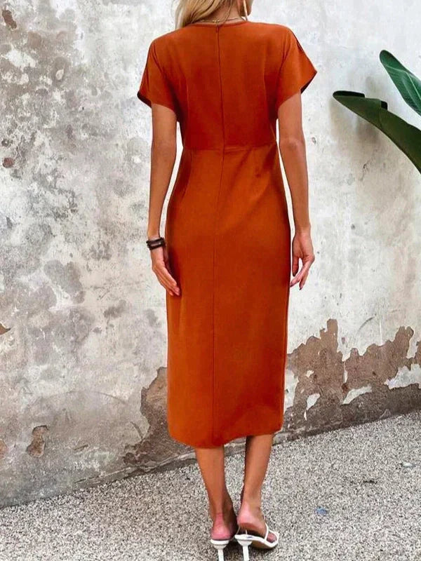 Ivaraen | Oranje midi-jurk voor dames – elegante bodycon jurk met V-hals en split