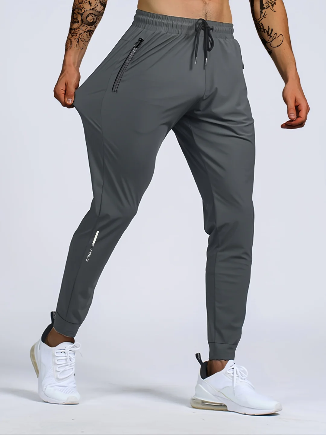 Kaevor | Stretch joggingbroek voor heren met slanke pasvorm en zakken met rits