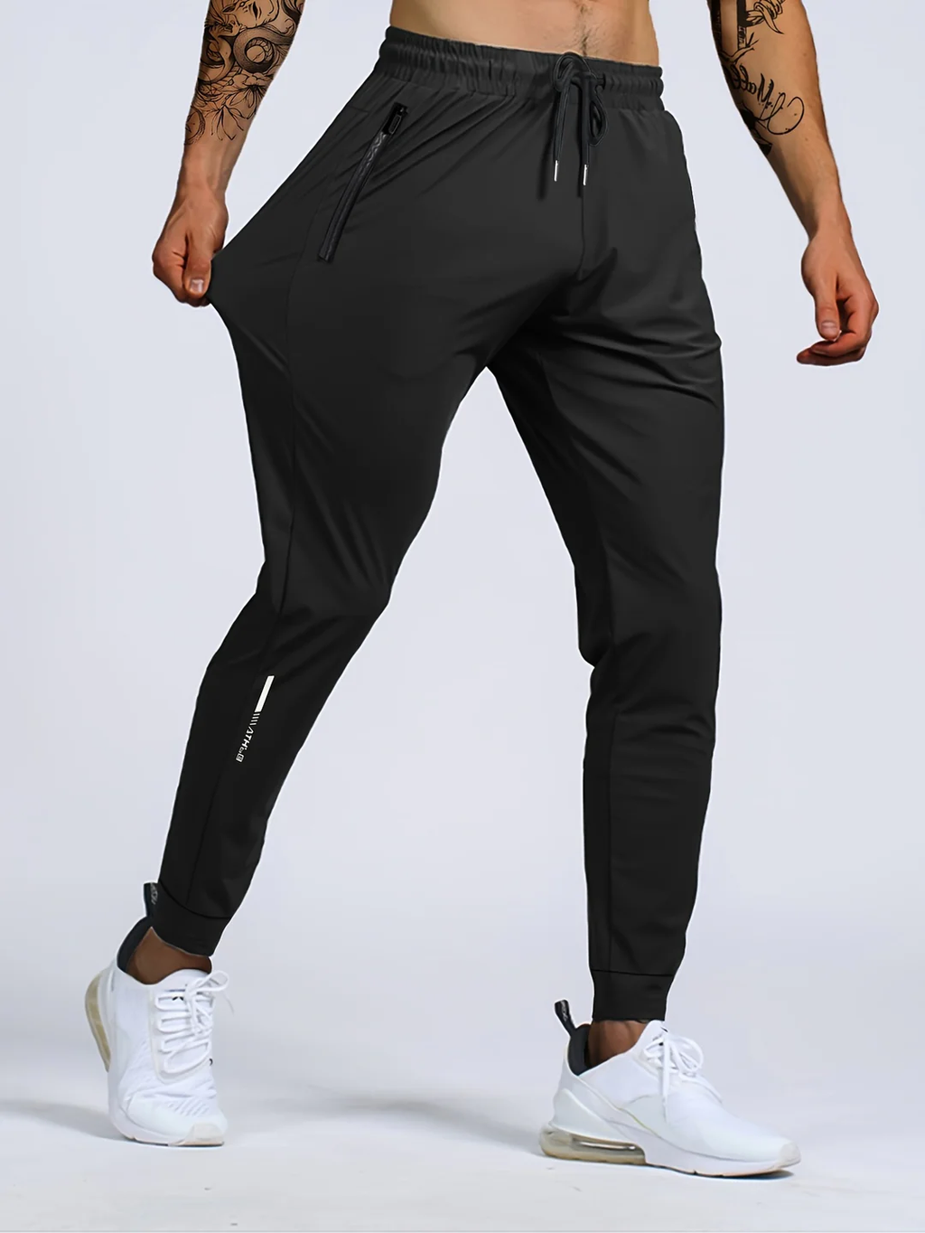 Kaevor | Stretch joggingbroek voor heren met slanke pasvorm en zakken met rits