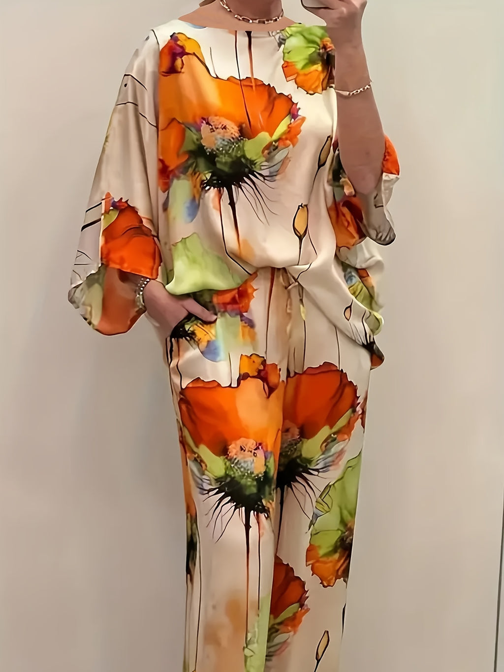 Evora | Vrouwenset met bloemenprint - Vloeiende blouse en broek met wijde pijpen