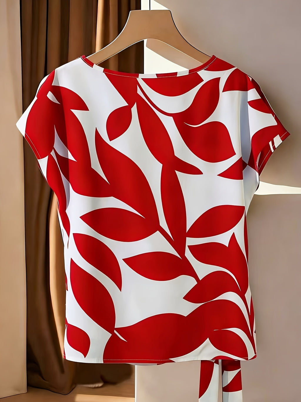 Belyn | Damesmode - Casual blouse met print, strik in de hals en geplooide manchetten