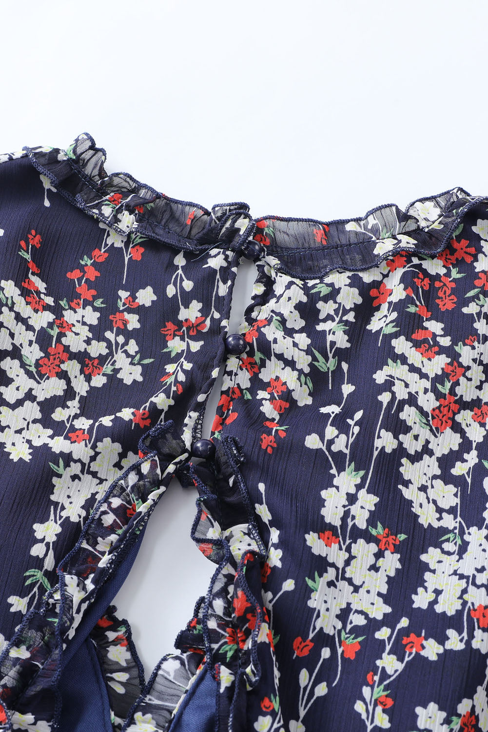 Nevara | Blauwe bloemenjurk voor dames met ruches, open rug, zomerse feest- en casual outfit