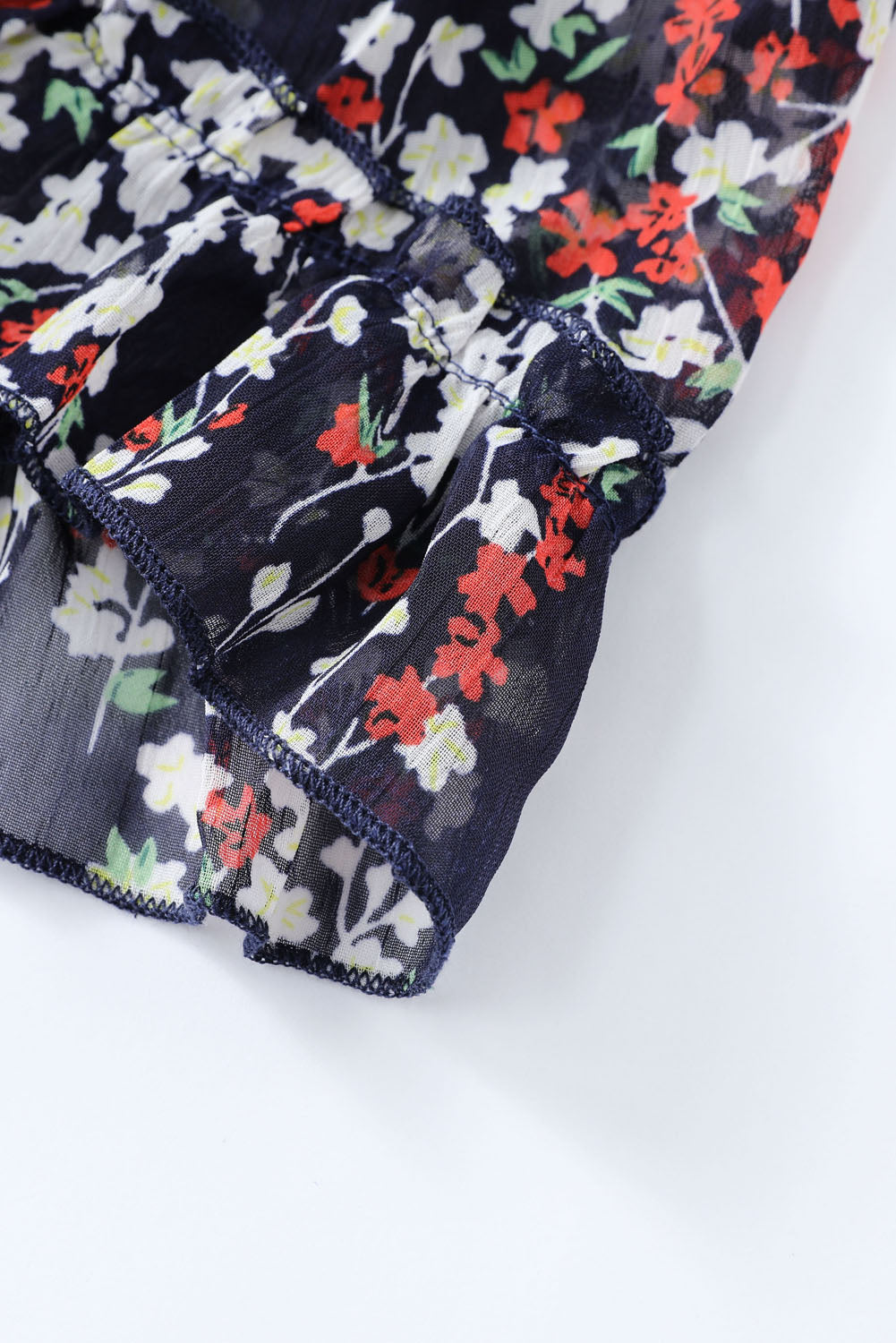 Nevara | Blauwe bloemenjurk voor dames met ruches, open rug, zomerse feest- en casual outfit