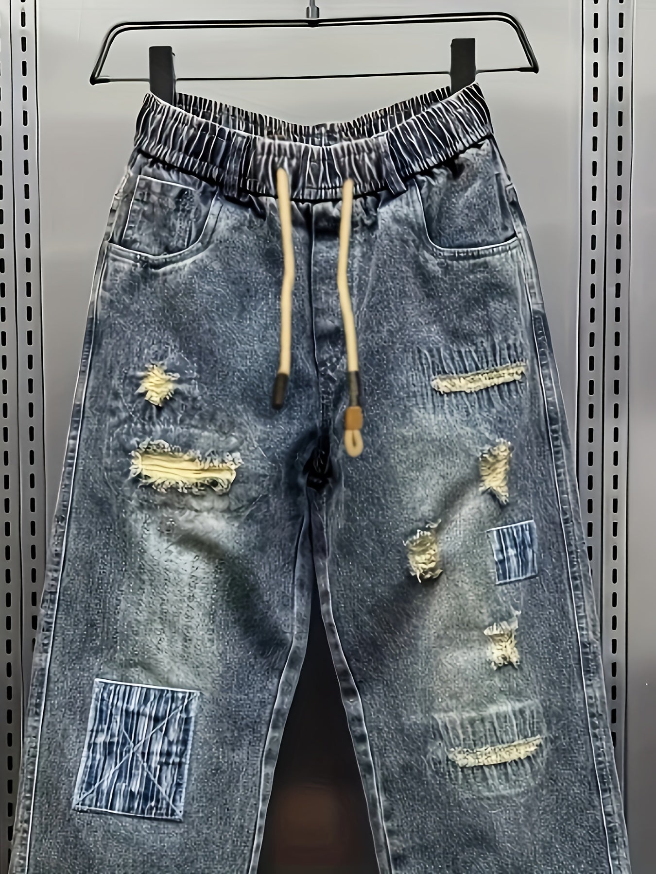 Nyxen | Damesbroek van patchwork-denim in distressed-look