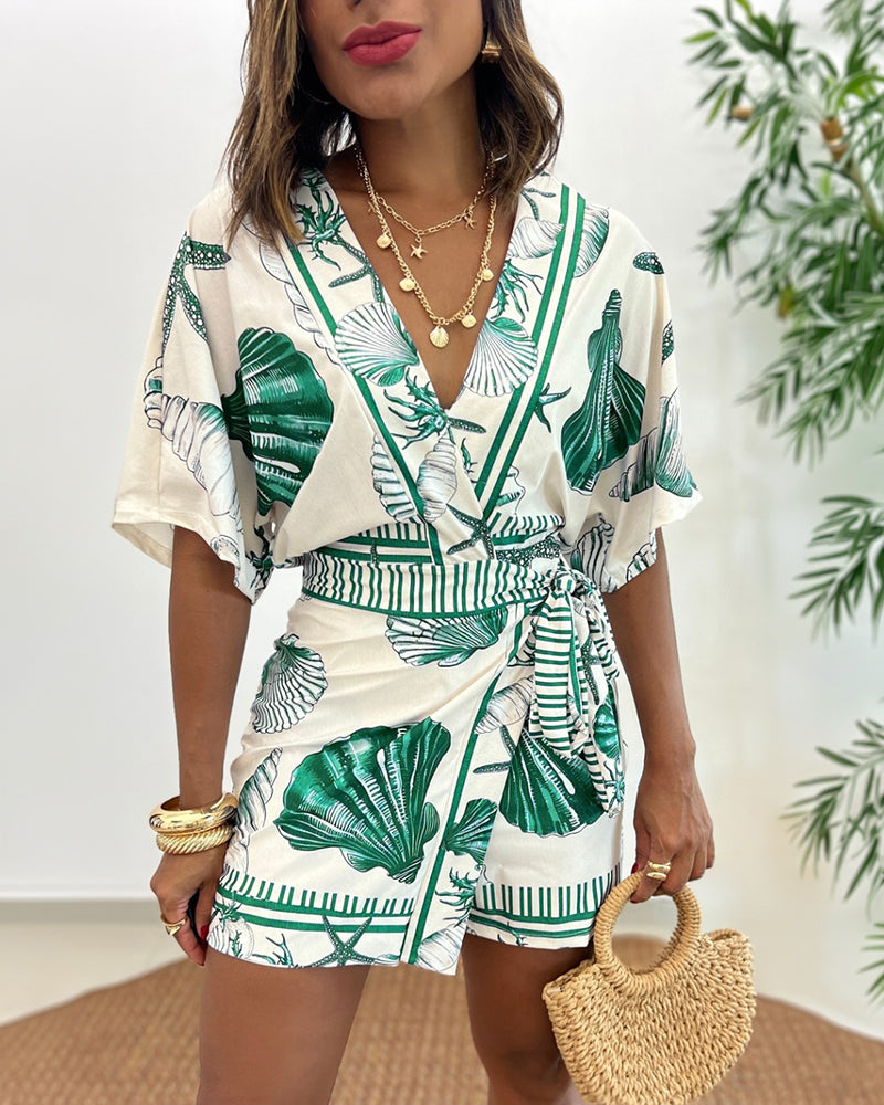 Lyrithia | Jumpsuit met V-hals en strandprint voor dames – Korte zomerjumpsuit