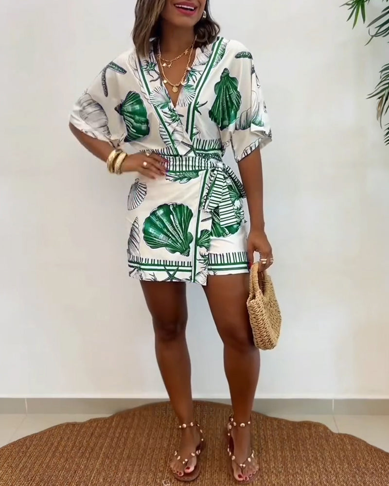 Lyrithia | Jumpsuit met V-hals en strandprint voor dames – Korte zomerjumpsuit