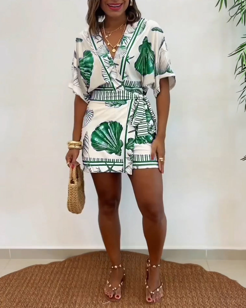Lyrithia | Jumpsuit met V-hals en strandprint voor dames – Korte zomerjumpsuit